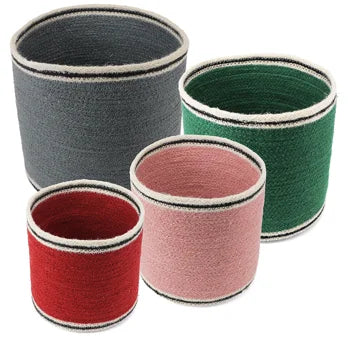 Round woven jute storage baskets in red, pink, green and blue, showing all four sizes; sold individually